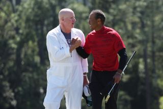 tiger woods with caddie
