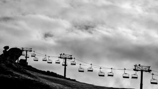 Nikon Z8 sample shot in black and white taken in New Zealand of chair lifts on a ski slope
