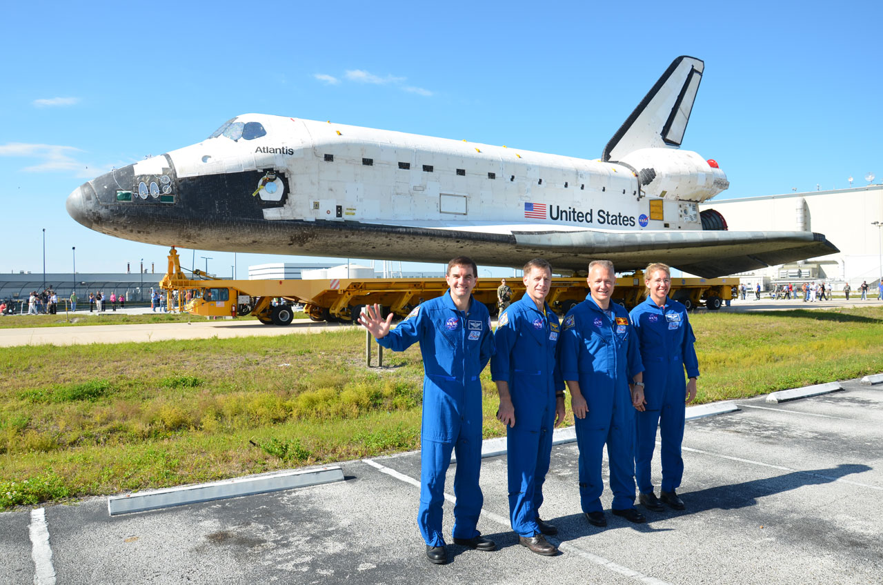 The crew of STS-135, NASA&#039;s final mission for its space shuttle program, pose in front of their spacecraft, space shuttle Atlantis on May 17, 2011. From left to right: mission specialist Rex Walheim, commander Chris Ferguson, pilot Doug Hurley and mission