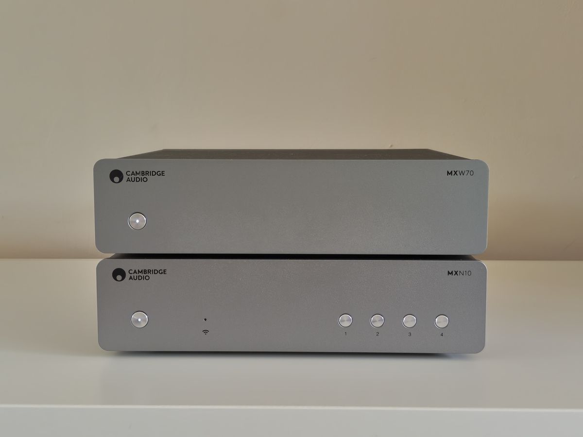 Cambridge Audio MXW70 power amp on book shelf with streamer