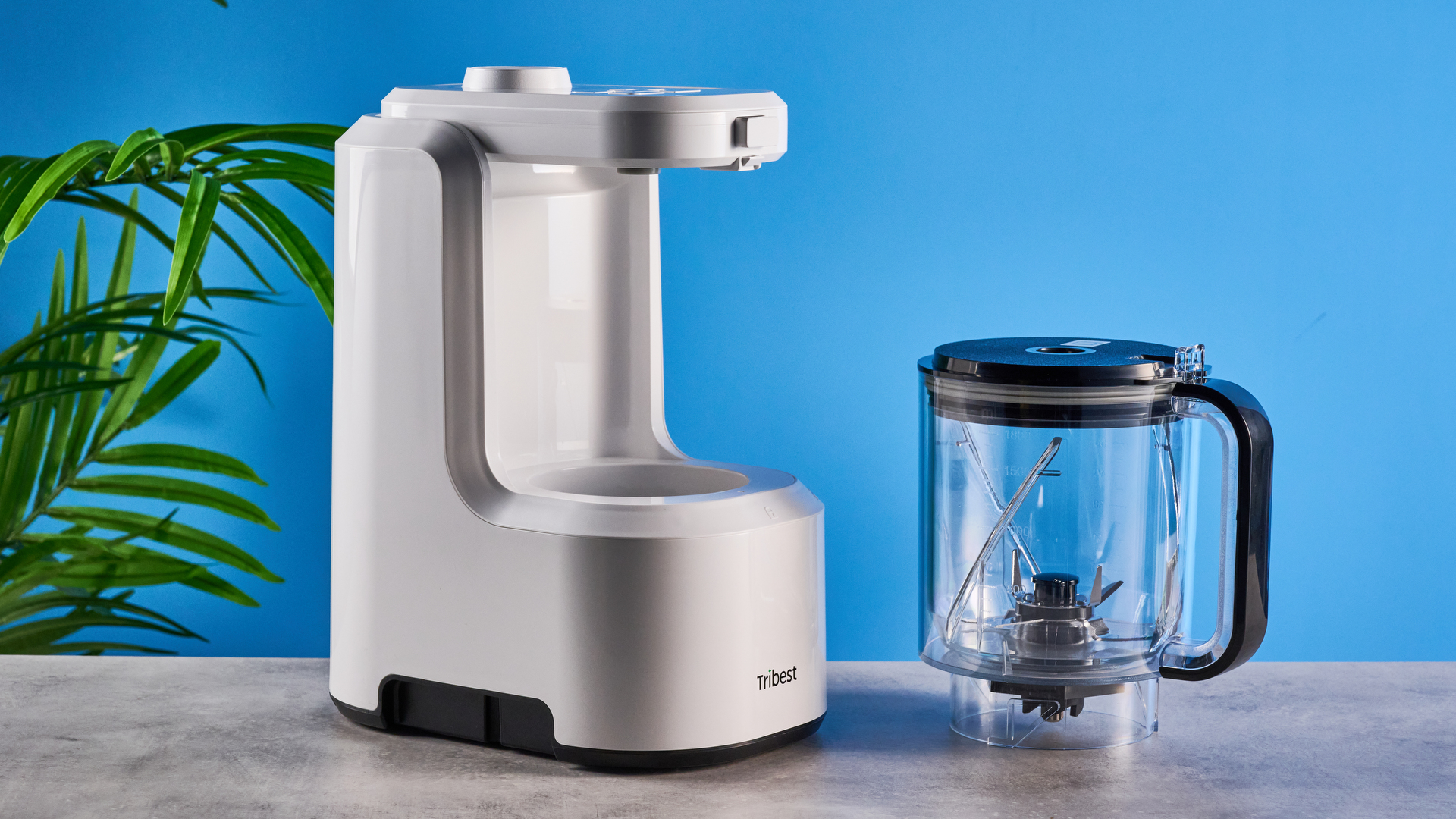 Tribest Backspin Blender photographed in front of a blue background