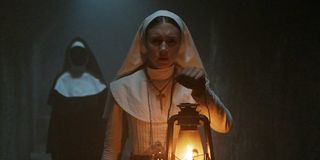 The Nun Vera Farmiga Sister Irene in hallway haunted by Valak