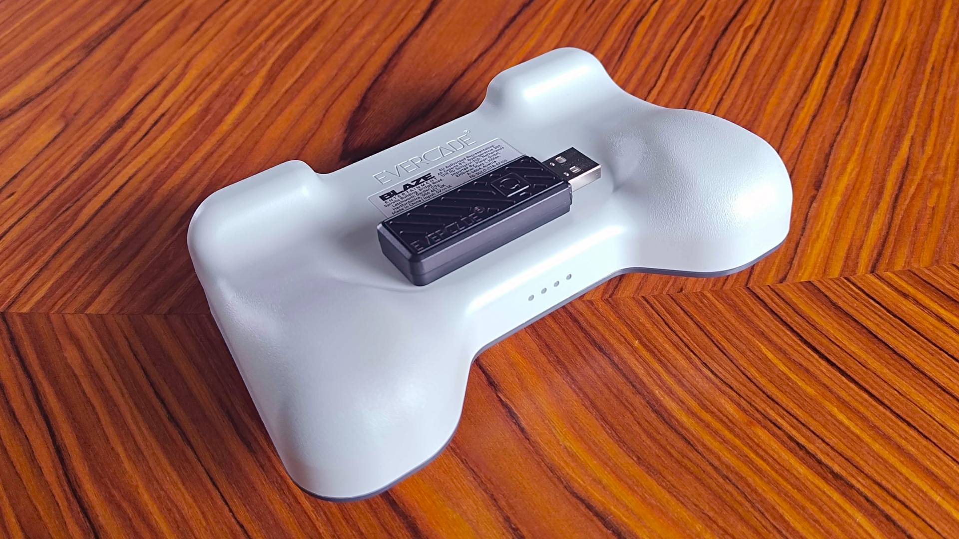 Back view of Evercade Dual Thumbstick Wireless Controller with dongle attached to back.