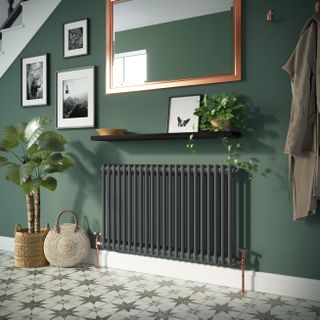 radiator in green hallway