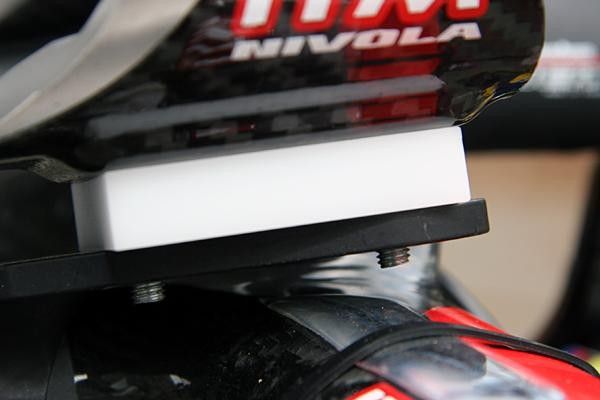 A centimetre-tall plastic wedge has been inserted to bump Verbrugghe's elbows a little higher.