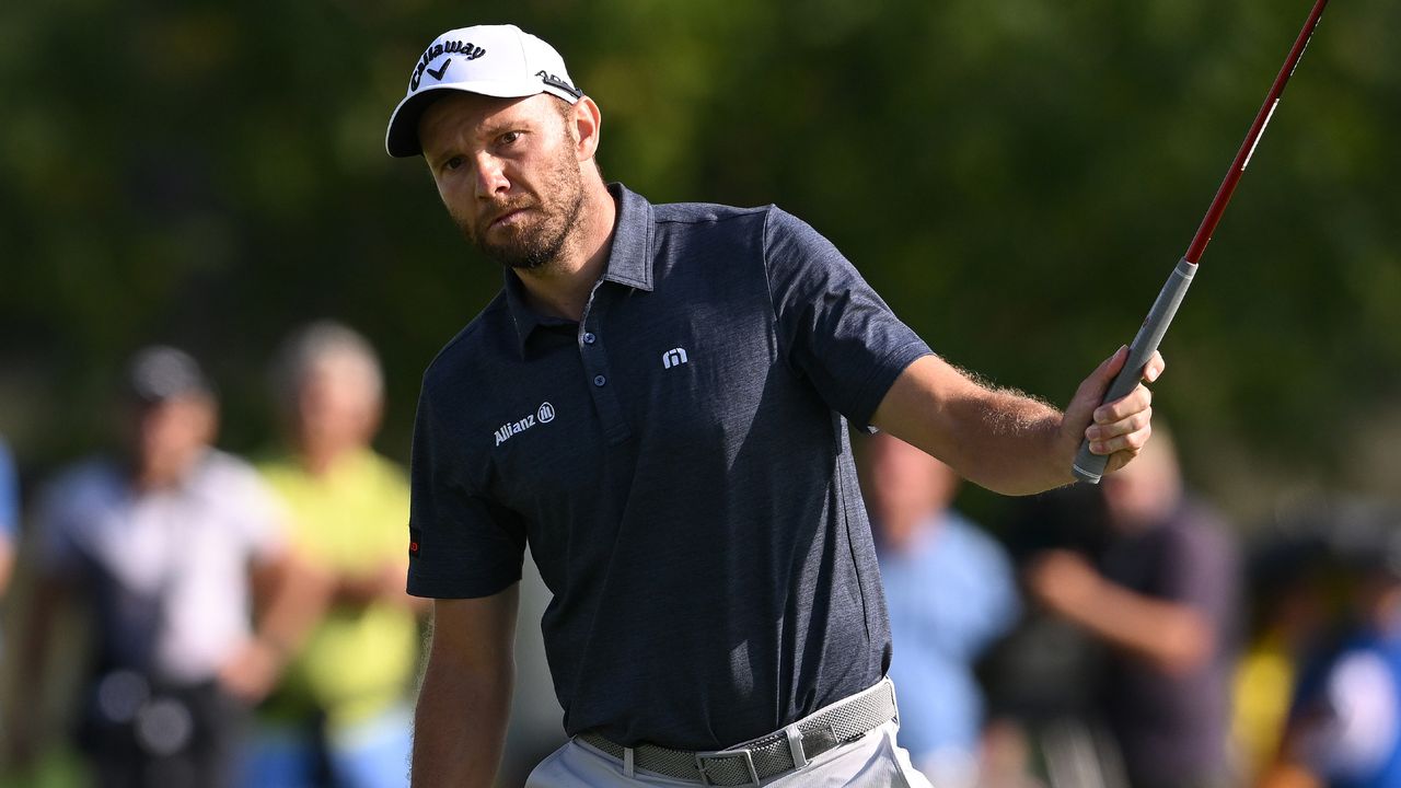 Max Kieffer reacts to a putt on the 18th green during the final round of the 2022 D+D Real Czech Masters at Albatross Golf Resort