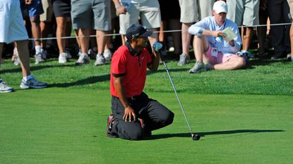 Tiger Woods struggles with injury at The Barclays in 2013