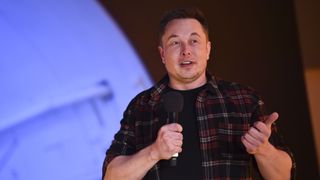 a photo of Elon Musk talking 