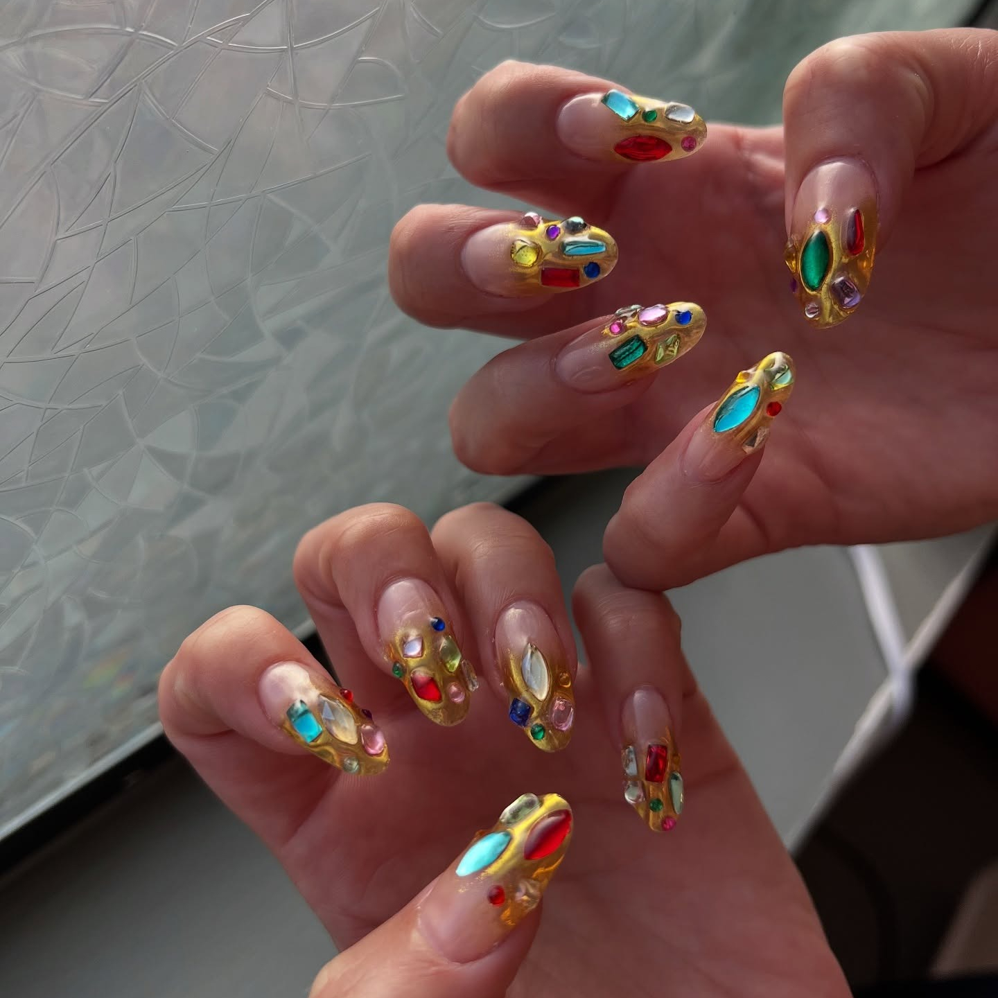 Opalite and gold nails
