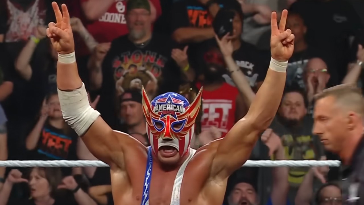 El Grande Americano chucks up deuces after qualifying for the Men's Money In The Bank ladder match.