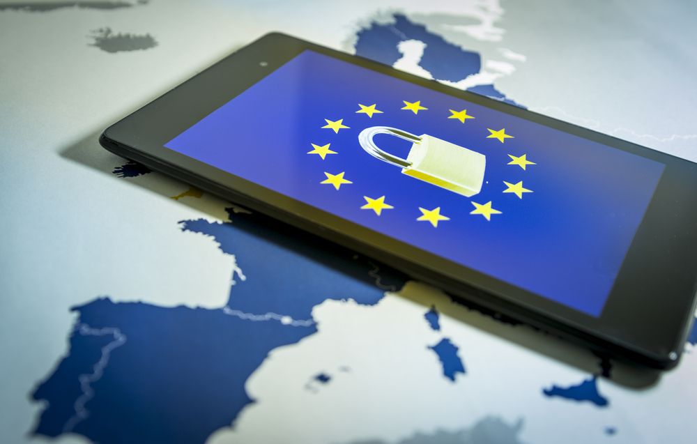 A smartphone over a map of Europe with a lock icon 