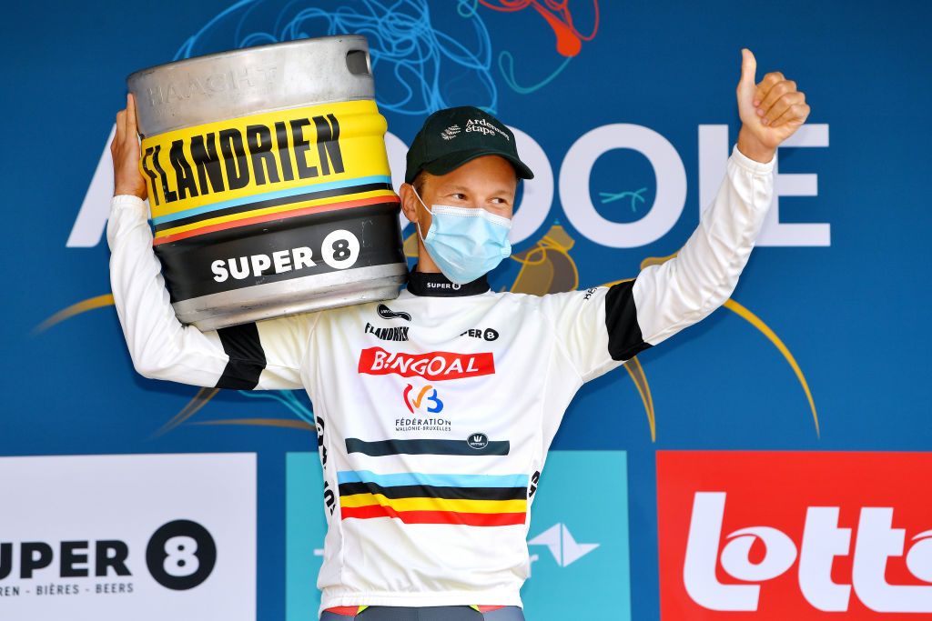 ARDOOIE BELGIUM SEPTEMBER 02 Arjen Livyns of Belgium and Team Bingoal WB celebrates winning the white combativity jersey on the podium ceremony after the 17th Benelux Tour 2021 Stage 4 a 1661km stage from Aalter to Ardooie BeneluxTour on September 02 2021 in Ardooie Belgium Photo by Luc ClaessenGetty Images