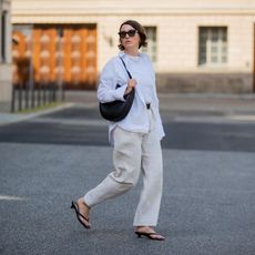 a woman wearing a white outfit