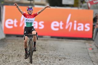 Hungarian Kata Blanka Vas celebrates as she crosses the finish line to win the Koppenbergcross