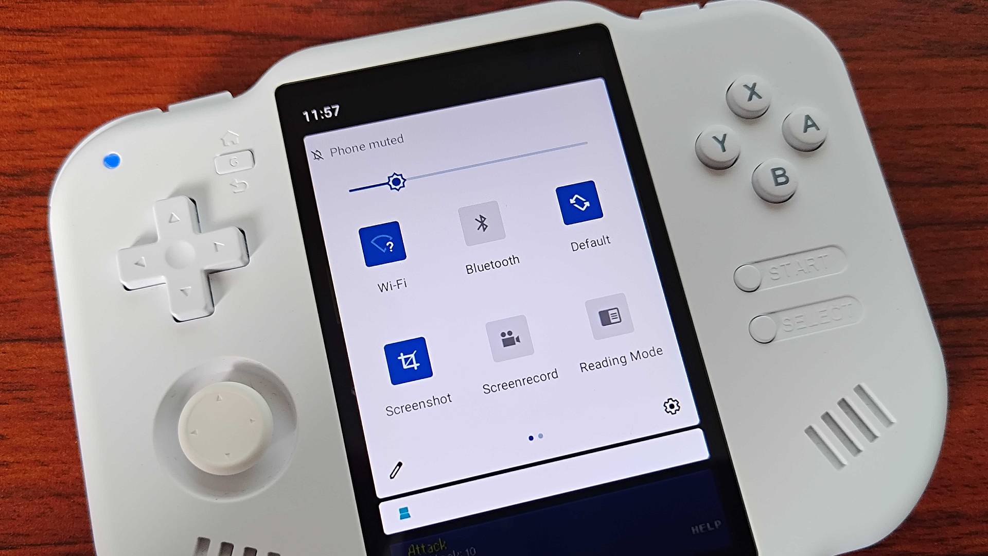 MagicX Zero 40 handheld with Android slide down menu on screen.