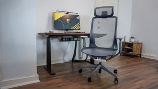 The Branch Aire Chair in front of a desk