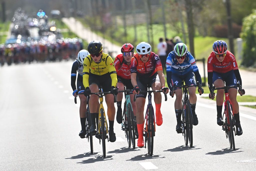 WEVELGEM BELGIUM MARCH 24 LR Lieke Nooijen of The Netherlands and Team Visma Lease A Bik Amandine Fouquenet of Norway and Team ArkeaBB Hotels Katia Ragusa of Italy and Team Human Powered Health Julie Van De Velde of Belgium and AG InsuranceSoudal Team and Giorgia Vettorello of Italy and Team Roland compete in the breakaway during the 13rd GentWevelgem in Flanders Fields 2024 Womens Elite a 1712km one day race from Ieper to Wevelgem UCIWWT on March 24 2024 in Wevelgem Belgium Photo by Luc ClaessenGetty Images