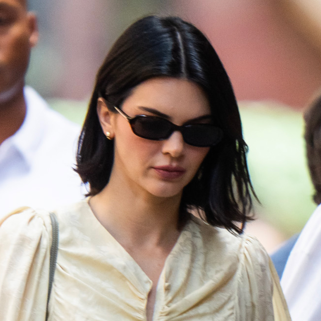 Kendall Jenner wears a butter yellow dress with sunglasses in New York City