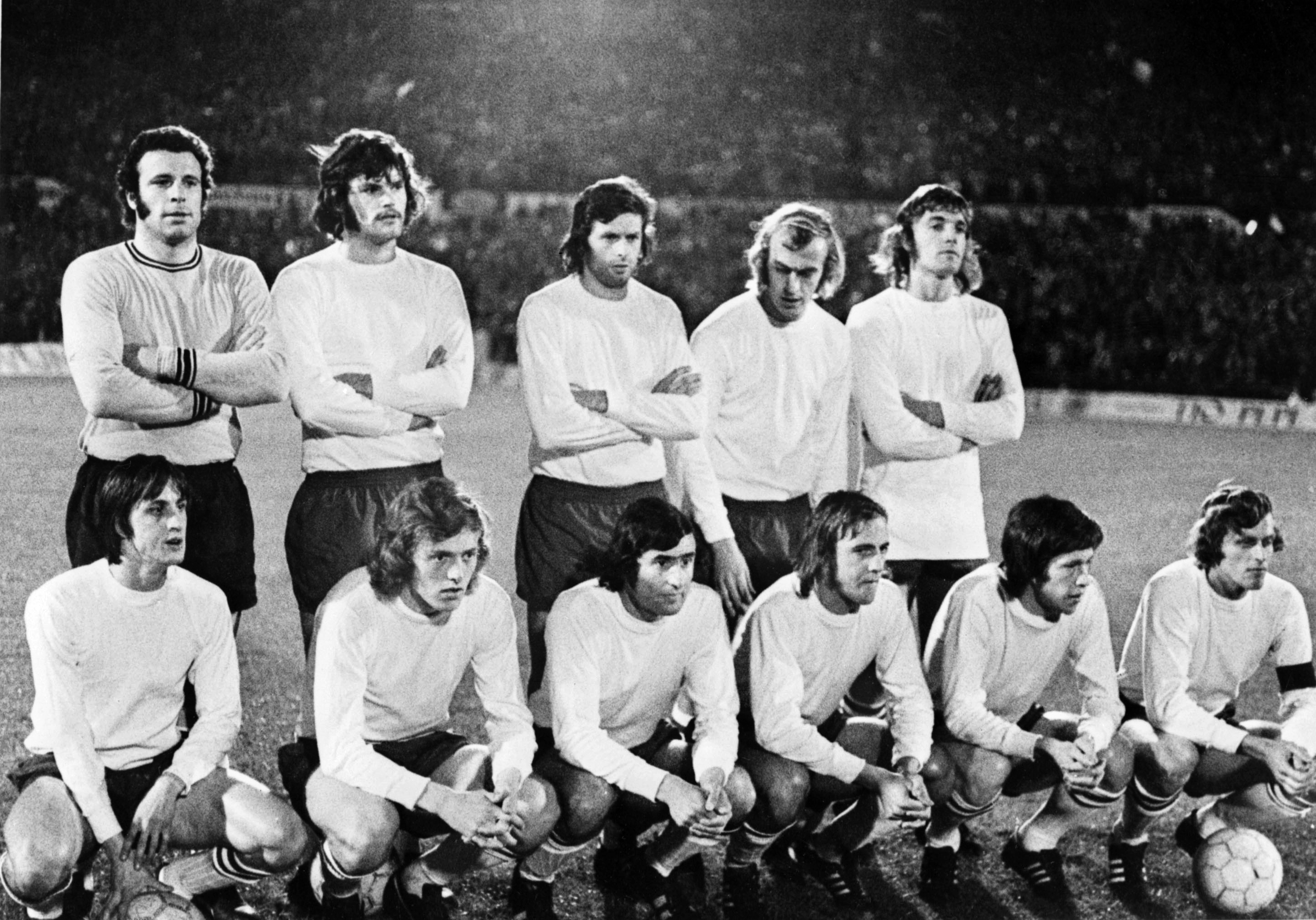 Arie Haan, second from left in the front row alongside Johan Cruyff, lines up with Ajax in April 1972.