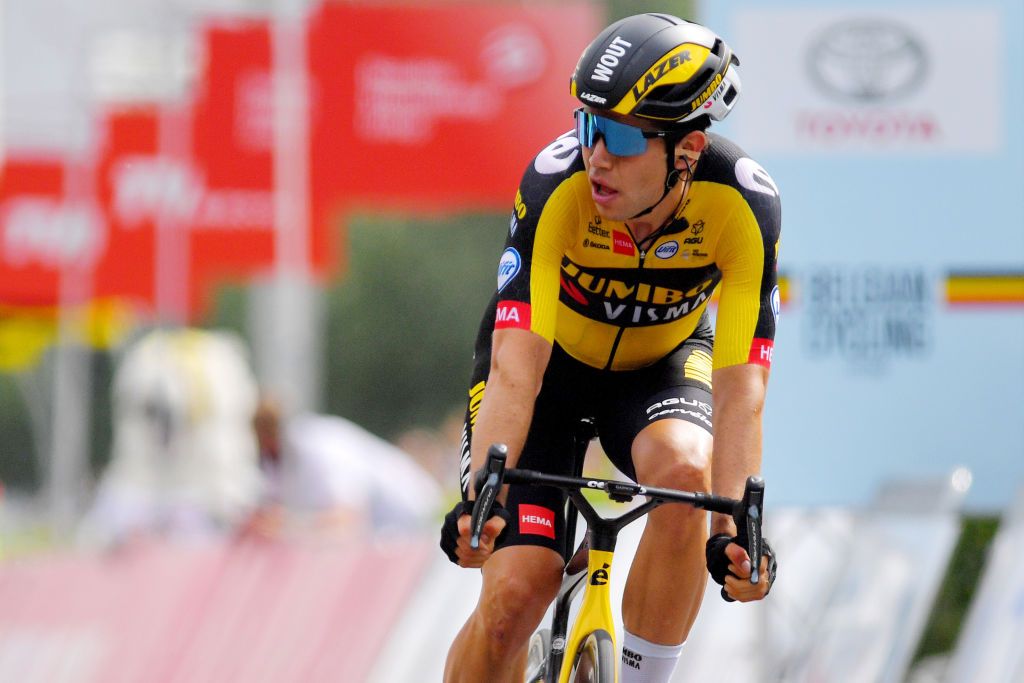 WAREGEM BELGIUM JUNE 20 Wout Van Aert of Belgium stage winner celebrates at arrival during the 122th Belgian Road Championship 2021 Mens Road Race a 2213km one day race from Waregem to Waregem BELCycling belgiancycling on June 20 2021 in Waregem Belgium Photo by Luc ClaessenGetty Images