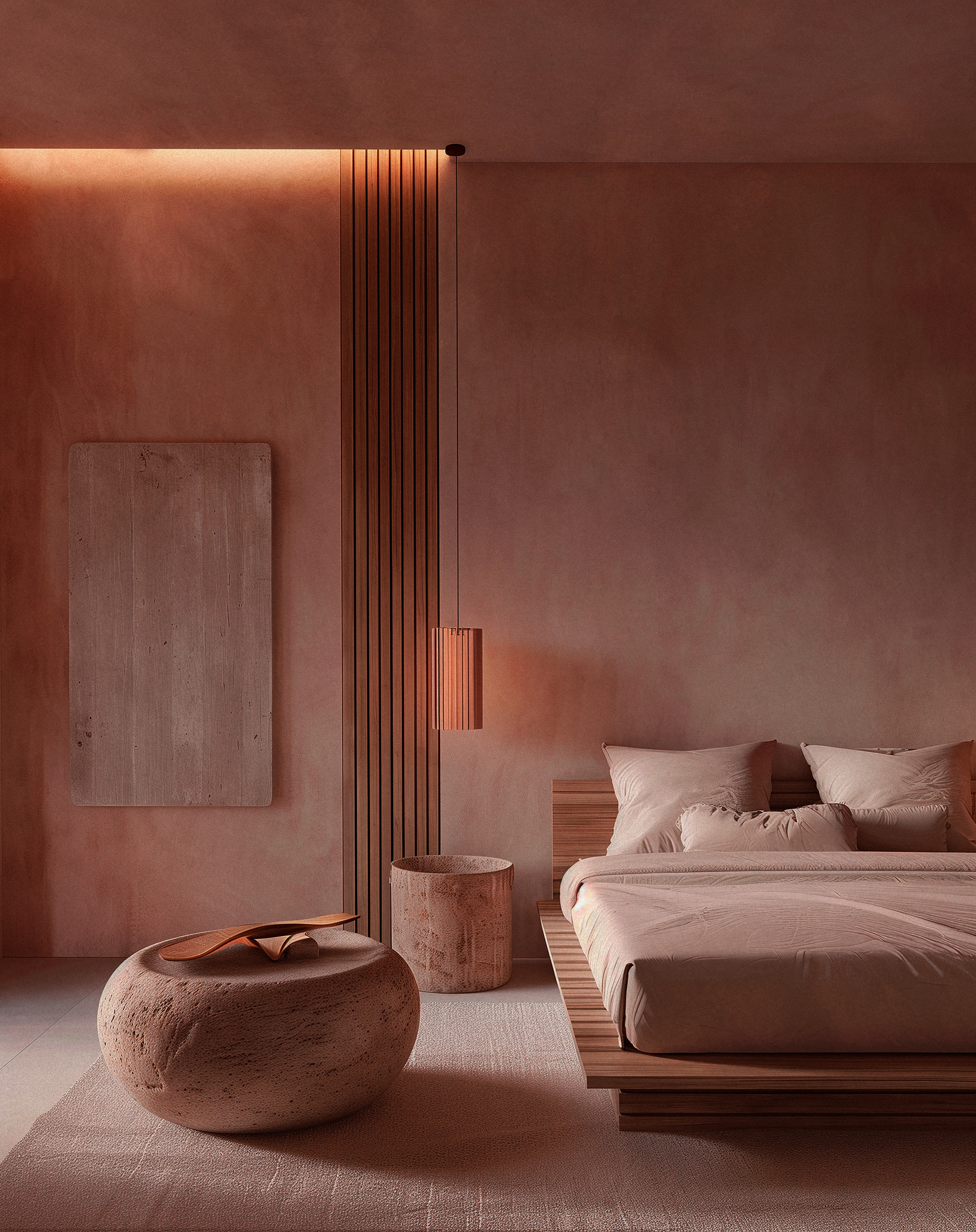 Bauwerk Colour pink limewash paint featured in a similarly pink colored bedroom, which includes a low-slung bed and coffee table.