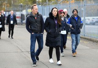 Football pundit, Lee Dixon on his way to look at the tributes which have been laid for Leicester City chairman Vichai Srivaddhanaprabha prior to the Premier League match between Leicester City and Burnley FC at The King Power Stadium on November 10, 2018 in Leicester, United Kingdom.