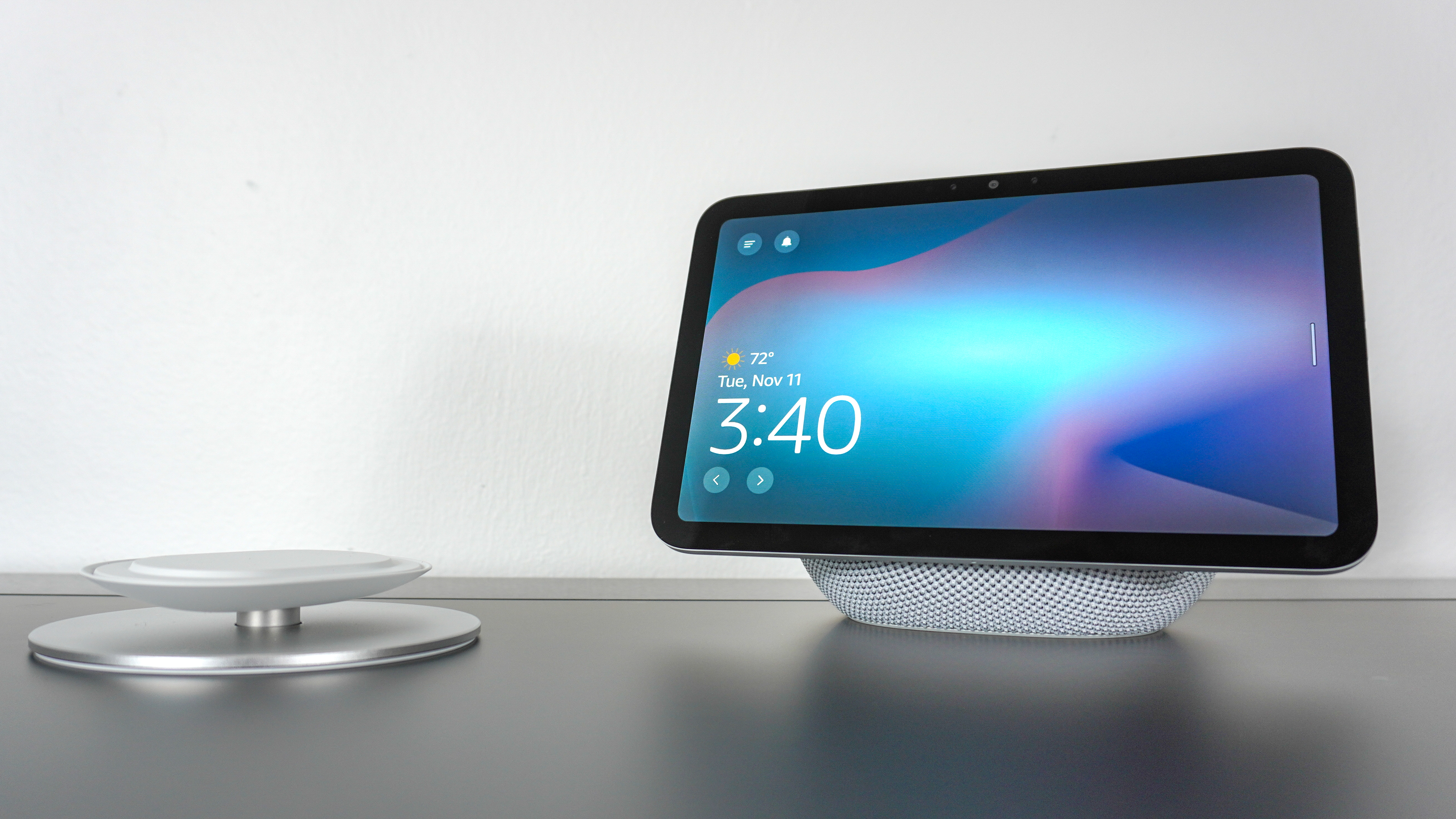 The Echo Show 8 (4th Gen) next to the optional adjustable stand on a desk