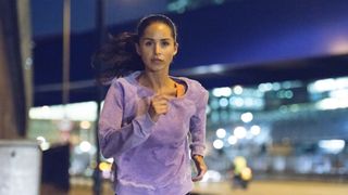 Woman running to keep fit