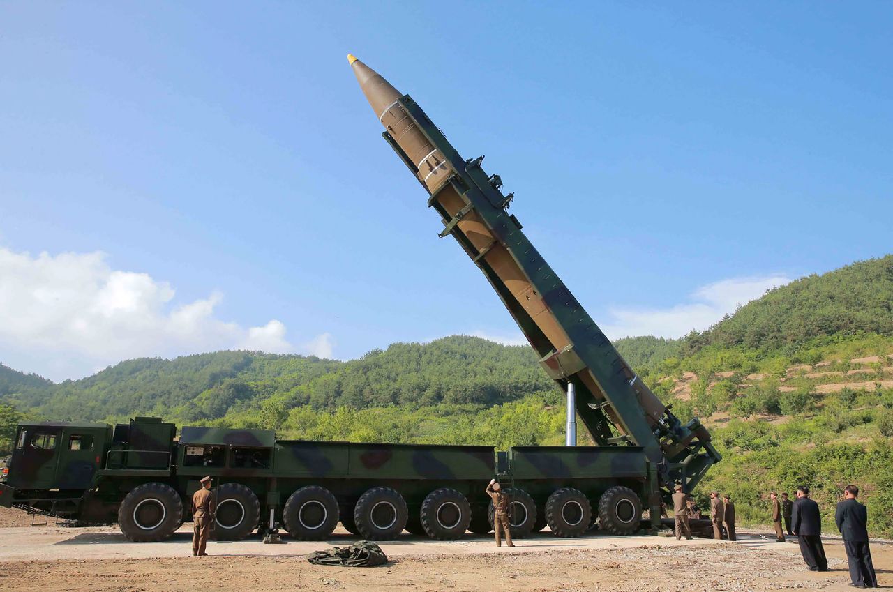 North Korean leader Kim Jong Un is seen inspecting the intercontinental ballistic missile Hwasong-14 launched Tuesday from an undisclosed location.