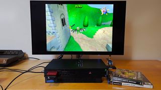 KTC G27P6 connected to PS2 with gameplay from Muppet Monster Madness on screen