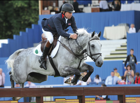 Nick Skelton riding Carlo 273, sired by Contender