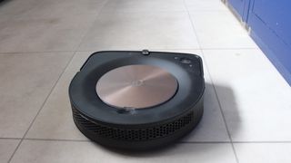 iRobot Roomba S9+ on a tiled floor