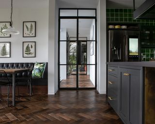 A Victorian-inspired industrial kitchen with crittall doors