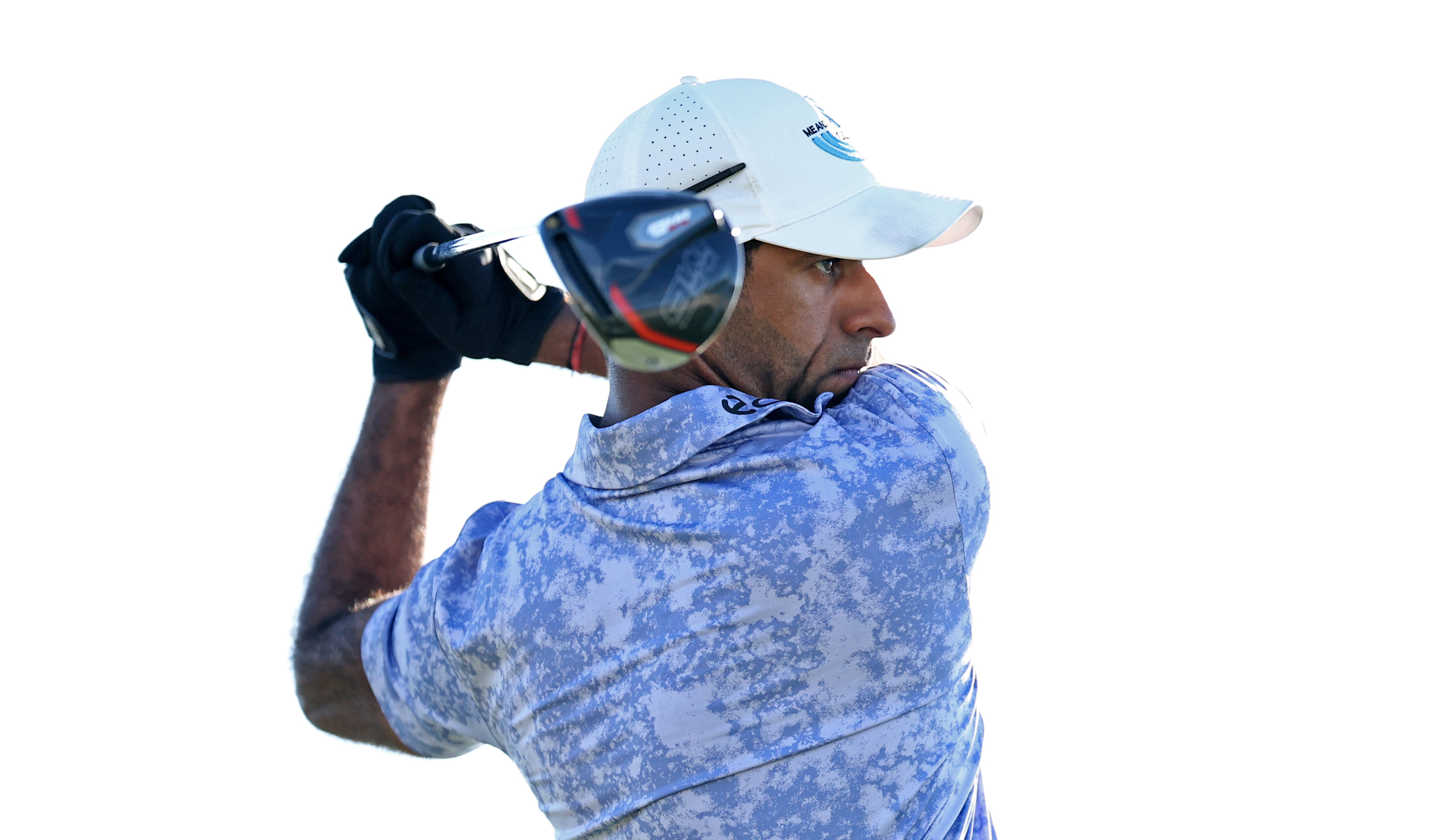 A close up of Aaron Rai hitting a driver