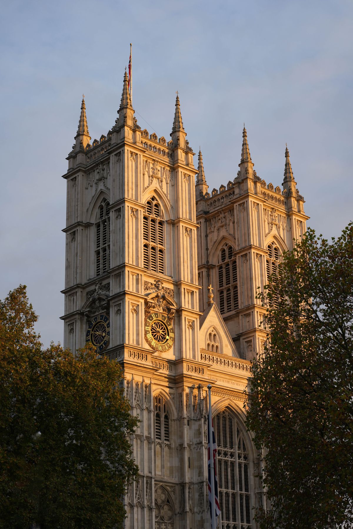 Sun setting against Westminster Abbey