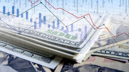 Close up of dollar bills overlaid with line graph and bar chart