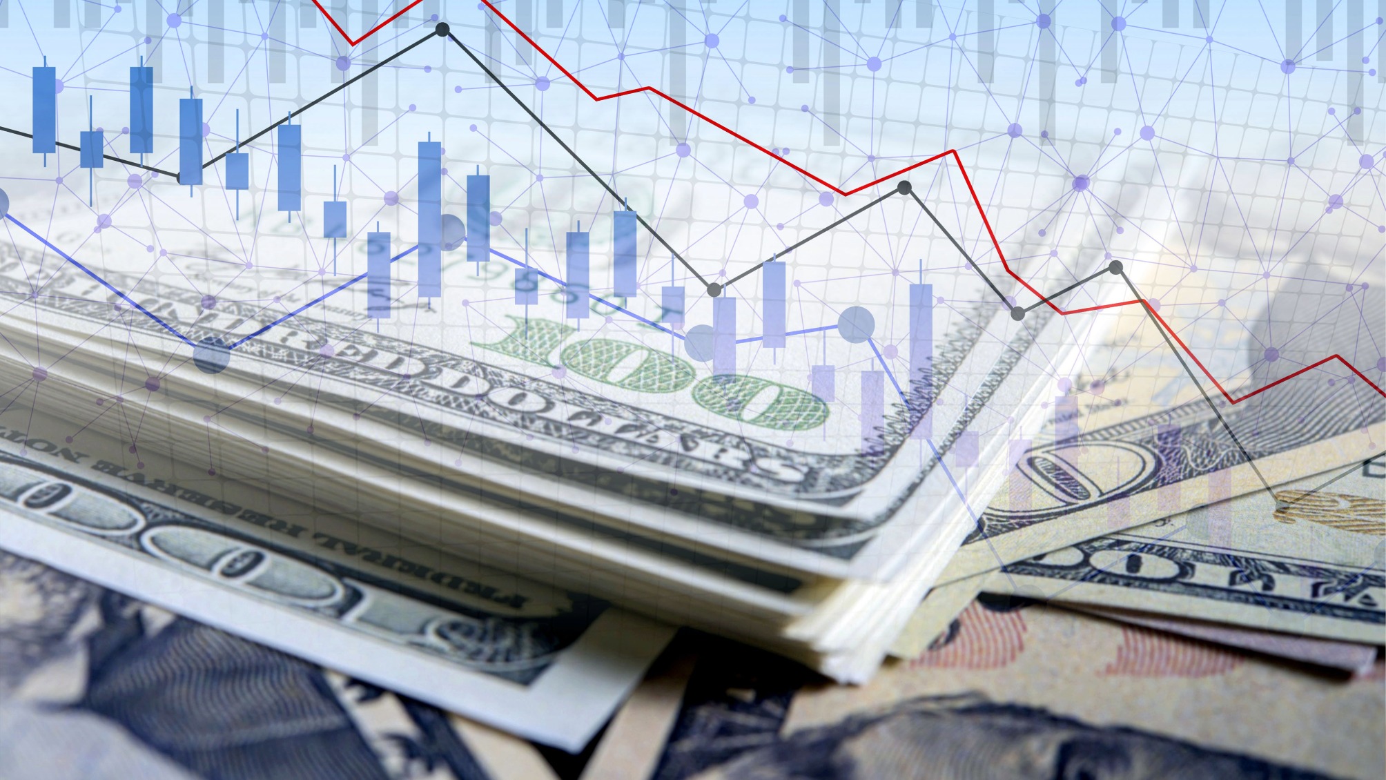 Close up of dollar bills overlaid with line graph and bar chart