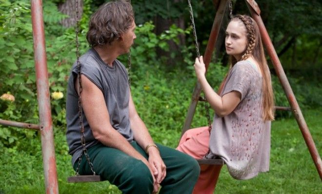 Jessa sits on a swing with her man-child of a dad.