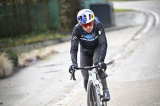 Tom Pidcock (Q36.5 Pro Cycling) on solo ascent of Muur van Geraardsbergen during a reconnaissance session ahead of Saturday's Omloop Het Nieuwsblad