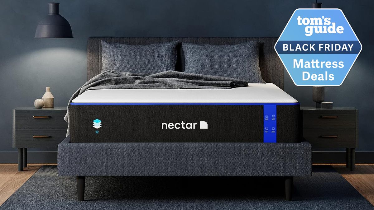 A Nectar mattress in a dimly lit bedroom with a Tom&#039;s Guide Black Friday deals bade