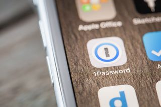 1Password app logo on a smartphone screen