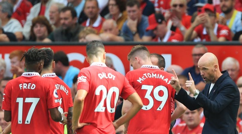 Erik ten Hag talks to his Manchester United players during the first half of the Premier League opener against Brighton.