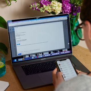 A journalist works in a home office