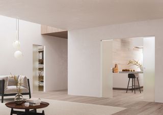 ECLISSE pocket doors in a living area with pale walls