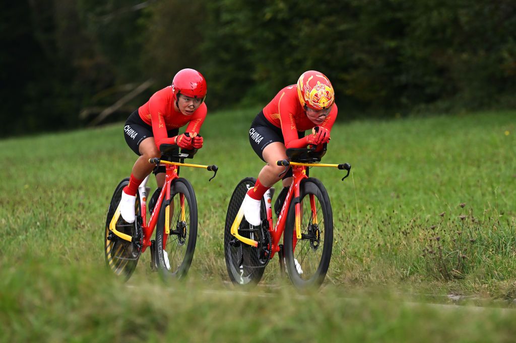 ZURICH SWITZERLAND SEPTEMBER 25 Xin Tang and Qiuying Zhou of Team China sprint during the 97th UCI Cycling World Championships Zurich 2024 Mixed Relay Team Time Trial a 537km one day race from Zurich to Zurich on September 25 2024 in Zurich Switzerland Photo by Tim de WaeleGetty Images