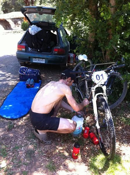 Mike Broderick preps the bikes for stage 5 of the TAC
