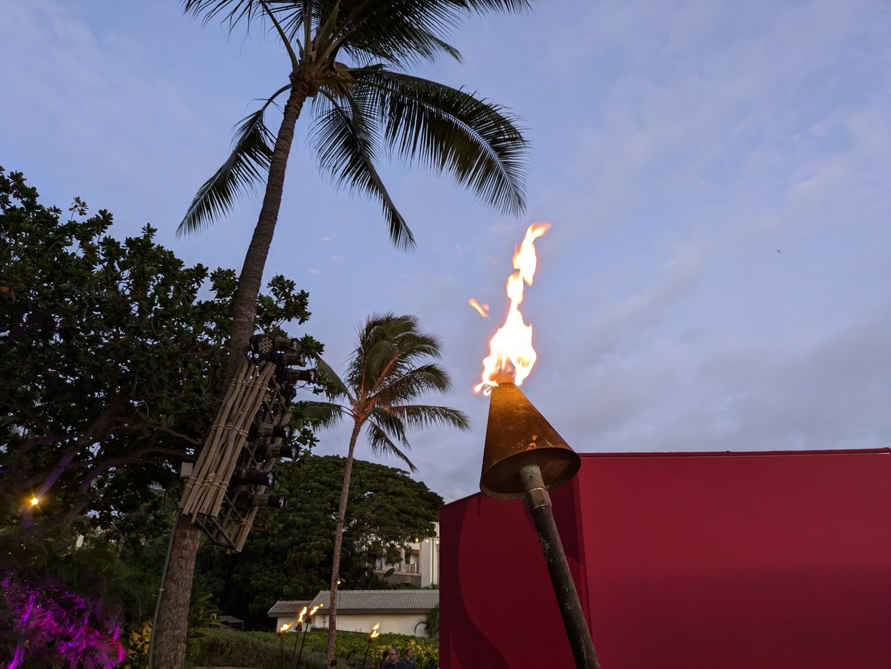tiki torch at dusk shot by google pixel 8a