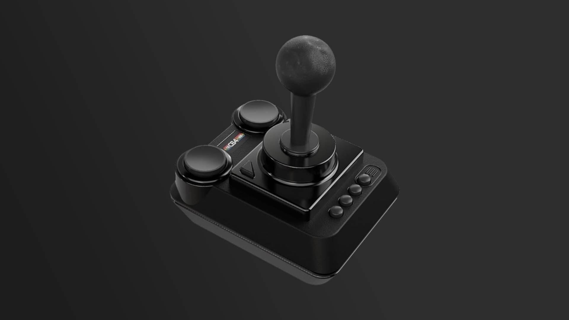 The C64 Mini Black Edition joystick with grey backdrop.