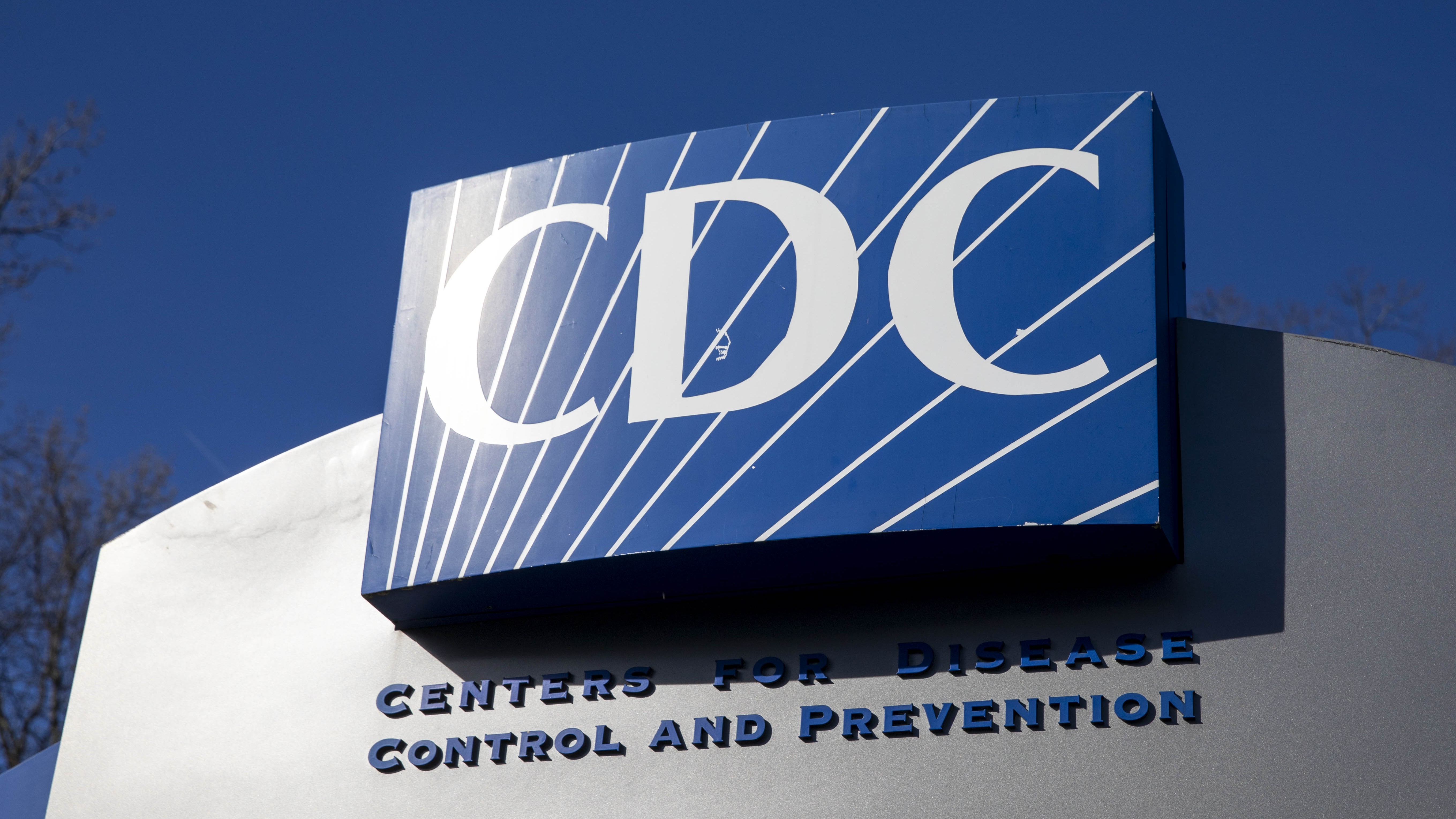 photo of a large outdoor sign reading CDC: Centers for Disease Control and Prevention 