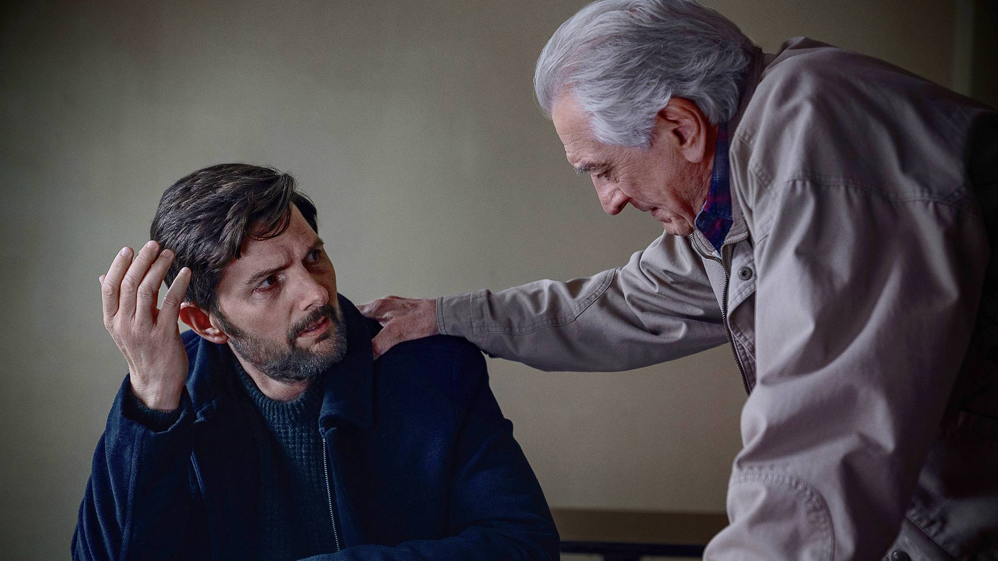 Adam Scott as Tom Kennedy and Robert De Niro as Peter Willis in "The Whisper Man" on Netflix